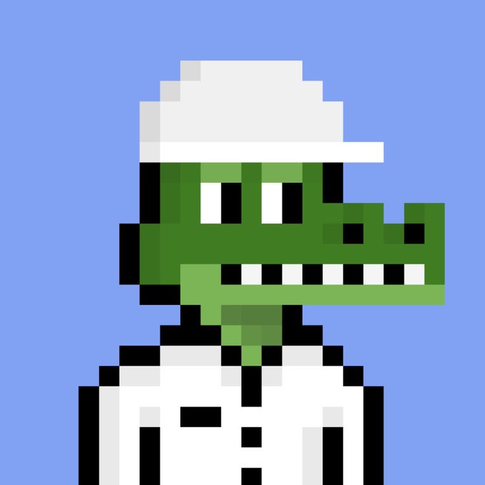 A pixel art illustration of a green crocodile or alligator head wearing a white hard hat and a white coat with a black button, set against a light blue background.