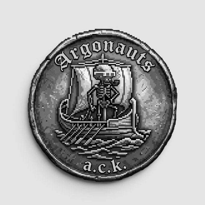 A grayscale pixel-art style coin featuring a skeleton in an ancient ship, with the text "Argonauts" arched above and "a.c.k." at the bottom.