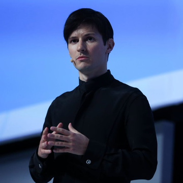 Pavel Durov, CEO of Telegram, stands on stage in a black shirt, appearing to address an audience. The image accompanies news of his announcement about Telegram launching a native Gram wallet for over 1 billion users.