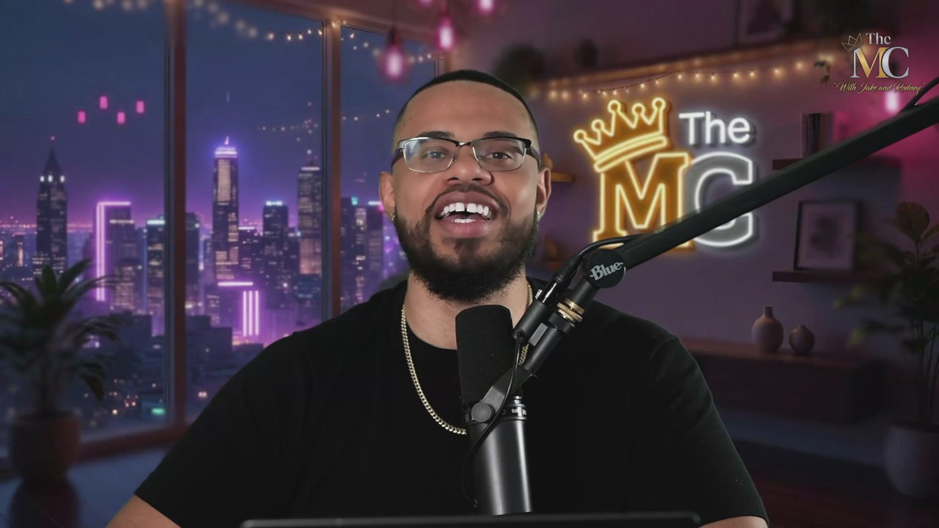 The image features a man wearing glasses, smiling at the camera while sitting behind a microphone. He appears to be talking about his experiences with Bitcoin, possibly discussing its value or sharing insights into the cryptocurrency market. The background of the image shows a city skyline, suggesting that he might be in an urban setting where such discussions could take place.