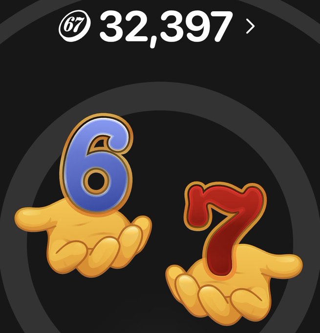 Mobile app icon or screen showing hands holding 3D-style blue '6' and red '7' digits on a dark background, with the number 32,397 displayed at the top.