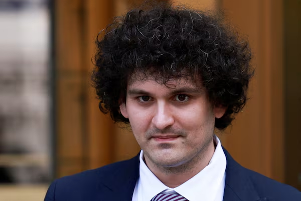 Sam Bankman-Fried, the former FTX CEO seen here leaving court, was once hailed as a crypto visionary whose venture investments—including stakes in Anthropic, Robinhood, and Solana—saw extraordinary returns before his empire collapsed amid fraud charges.
