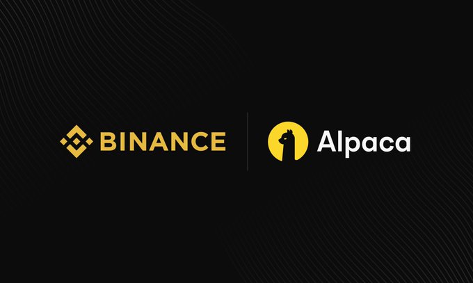 The image features two logos - one for Bitcoin and another for Alpaca. The Bitcoin logo has a yellow "B" and a black "N", while the Alpaca logo has a yellow "A" and a black "P". Both logos are displayed against a black background, with the Bitcoin logo positioned above the Alpaca logo. The image also contains text that reads: "Binance, the largest digital asset platform serving over 300 million users, has launched US stocks and ETFs trading, advancing their vision to become a multi-asset financial super app".