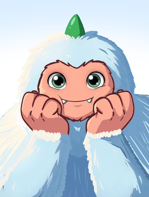 Anime-style chibi character with big green eyes, fangs, and a light blue furry hood featuring a green crystal on top.