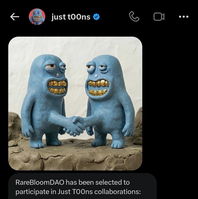 Instagram post from 'just t00ns' showing a sculpture of two blue figures with gold teeth shaking hands, captioned 'RareBloomDAO has been selected to participate in Just T00ns collaborations.'