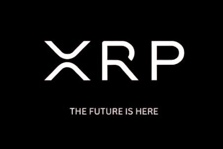 A black background displaying the white 'XRP' cryptocurrency logo with the text 'THE FUTURE IS HERE' beneath it.