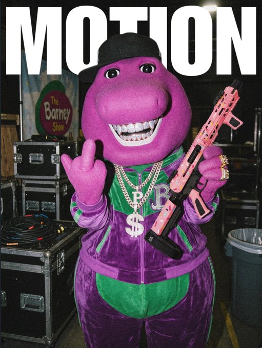 A purple Barney the Dinosaur mascot poses holding a pink rifle, wearing a green and purple tracksuit, a black cap, a chain with a dollar sign pendant, and a large ring, with the word 'MOTION' in large white text above and a 'The Barney Show' logo in the background.