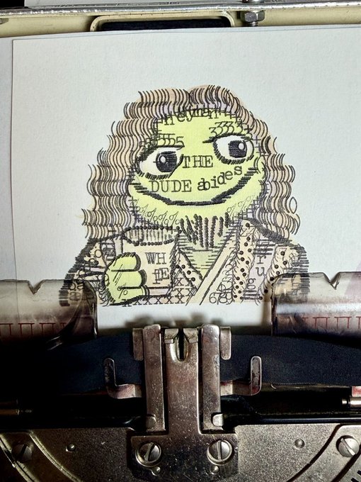 A typewriter typing out a character that resembles 'The Dude' from The Big Lebowski, with dollar bill patterns forming the hair and 'THE DUDE abides' text making up the face.