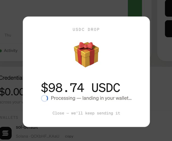 A screenshot of a 'USDC DROP' notification showing $98.74 USDC being processed and landing in a wallet, with the message 'Close - we'll keep sending it' displayed below.