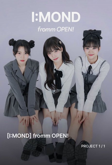 A promotional image for 'I:MOND fromm OPEN!' features three young women in school-uniform-inspired outfits posing together against a light purple background, with the text 'PROJECT 1/1' in the corner.