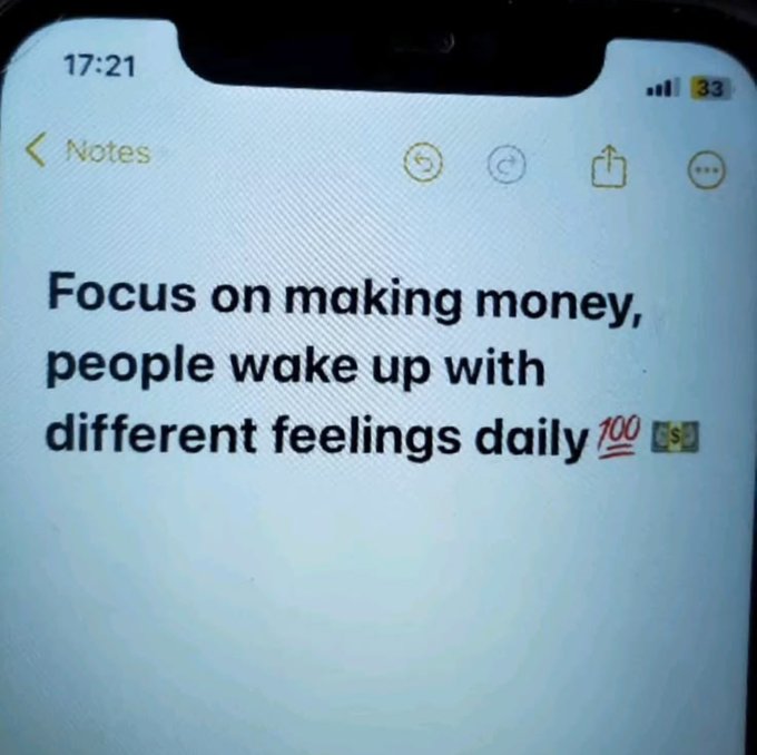 A smartphone screenshot of a Notes app displays the text 'Focus on making money, people wake up with different feelings daily' followed by a 💯 emoji and a money bag emoji.