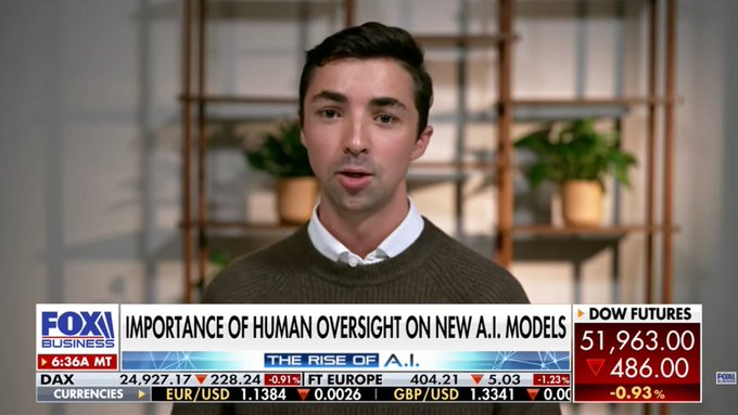 A Fox Business broadcast showing a male presenter, with a lower-third graphic reading 'IMPORTANCE OF HUMAN OVERSIGHT ON NEW A.I. MODELS' and stock tickers showing DOW FUTURES at 51,963.00.