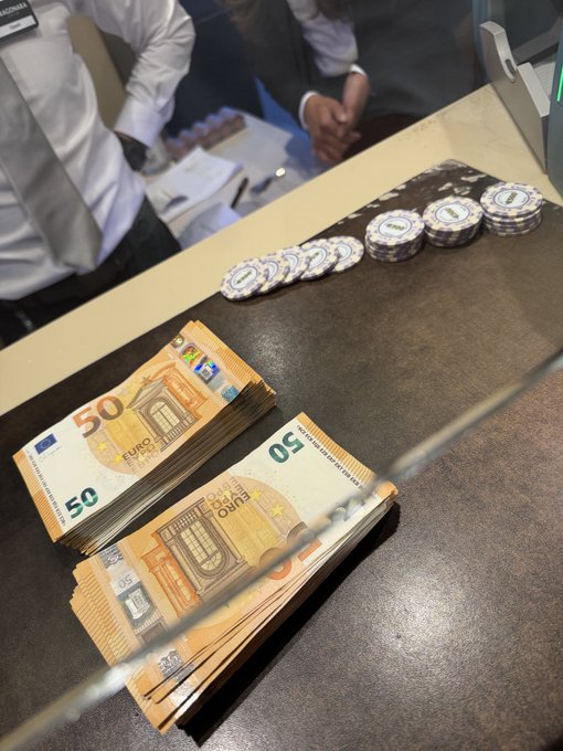 A cash count showing stacks of €50 Euro notes and coins on a counter, fitting the post's "Guess my total profit" giveaway where viewers estimate the 30-day earnings to win $100.
