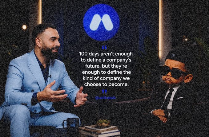A man in a blue suit speaking in what appears to be a talk show setting, alongside a quote reading "100 days aren't enough to define a company's future, but they're enough to define the kind of company we choose to become" attributed to @sundarpichai, with the Meta logo displayed above.