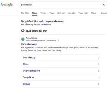 A Google search results page in Vietnamese for 'pancakeswap', showing official PancakeSwap links for https://pancakeswap.com including Launch App, Docs, User Dashboard, Swap Now, and Bridge.