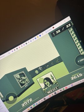 A person is playing a hidden object puzzle game on a computer, having found coins including a "Medal" coin and a "Paper" coin on a green desk surface. The game shows a timer of 2:22 and a coin counter at 32/33, reflecting the player's struggle to find that final elusive coin mentioned in the post.