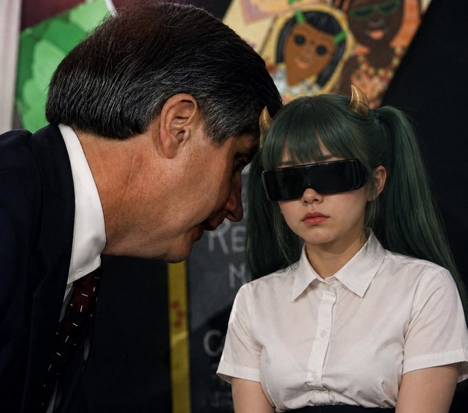 A suited man leans in toward a woman with green twin-tail hair, horned headband, and dark sunglasses, while a child's drawing appears in the background. The post "the trenches are desperate for a runner" suggests the image humorously captures a recruiter "scouting" the anime-styled woman as a potential candidate.