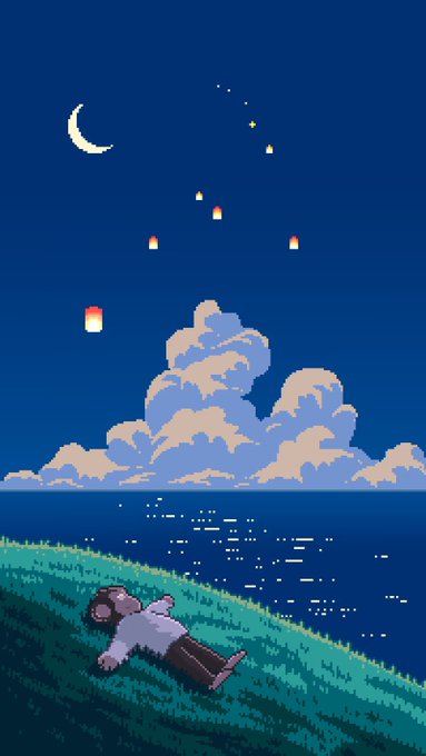 A pixel art piece depicts a person lying on a grassy hillside by the sea, gazing up at a starry night sky filled with floating lanterns and a crescent moon, perfectly capturing the whimsical, dreamlike quality of the sold NFT titled "Dreaming is Free."