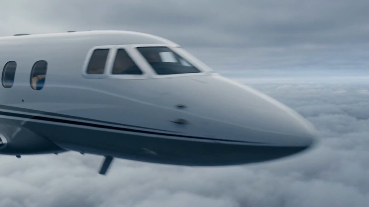 The image shows a white airplane flying through a cloudy sky, possibly above an airport or a mountainous area. The airplane appears to be moving at a high speed as it soars over the clouds. The photo has been edited with a grainy appearance, giving it a vintage feel. The caption below the image provides some context about the post's content and suggests that the viewer might be interested in learning more about managing their business or dealing with complex accounting tasks without the need for gas.