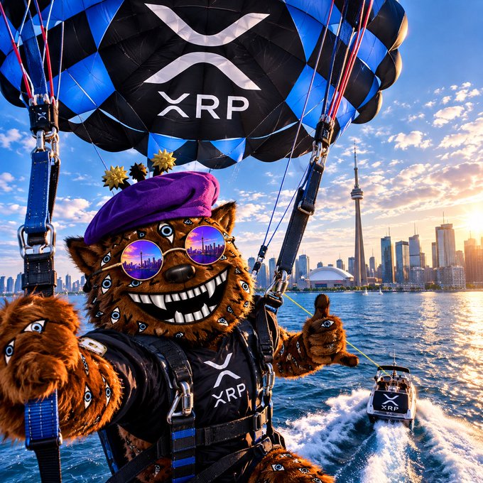 A brown furry mascot character wearing sunglasses and a purple beret parasails with an XRP-branded parachute over a city skyline, with XRP also visible on a speedboat below.