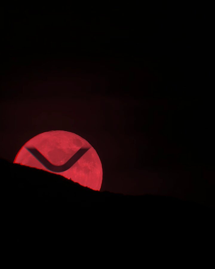 The image features a red sunset with a large moon, creating a striking contrast against the dark sky. In the bottom right corner of the photo, there's an image of a logo for Ripple cryptocurrency, which has been edited to appear as a red circle with a black "X" inside it. The post includes text that reads: "I’ve seen this mood before... XRP is warming up."