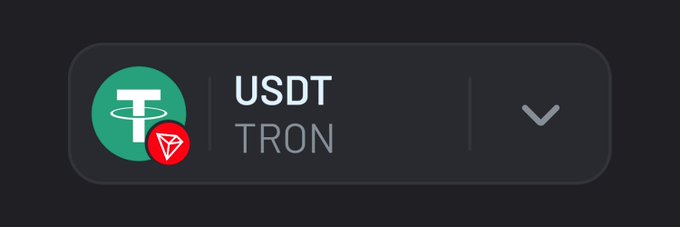 A dark-themed digital button displaying the USDT TRON token, featuring the green Tether logo alongside a red TRON diamond badge, with a dropdown arrow on the right. The image visually represents the post's announcement of TRON's integration on the Across protocol, highlighting USDT on TRON as an available asset.
