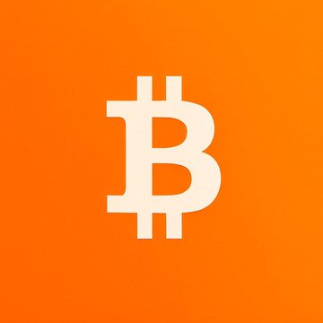 A white Bitcoin logo centered on a bright orange background.