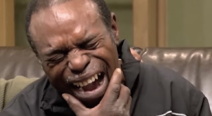 A close-up image captures a man with his eyes shut tight and mouth open in an exaggerated wince of pain or anguish, holding his face near his mouth. The dramatic expression visually conveys a reaction of distress or disappointment, humorously aligning with the post's suggestion that "Saylor's not going to buy Bitcoin any time soon."