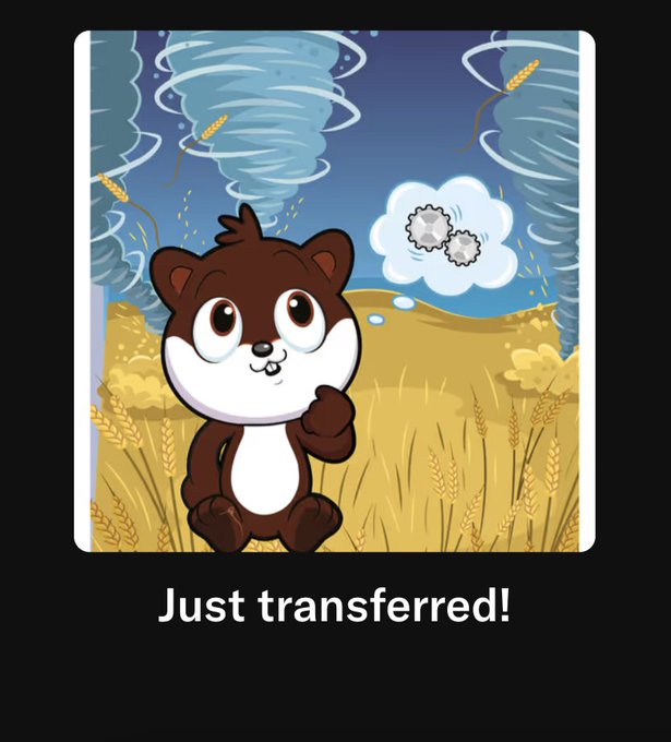 An animated cartoon chipmunk sits in a wheat field next to two tornadoes with a thought bubble showing gears, with the text "Just transferred!" below.