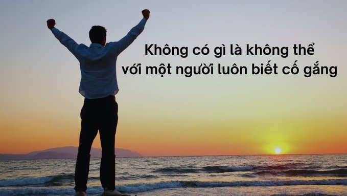 A motivational image of a man in a blue shirt with raised arms standing on a beach at sunset, with Vietnamese text: 'Không có gì là không thể với một người luôn biết cố gắng' (Nothing is impossible for someone who always tries).