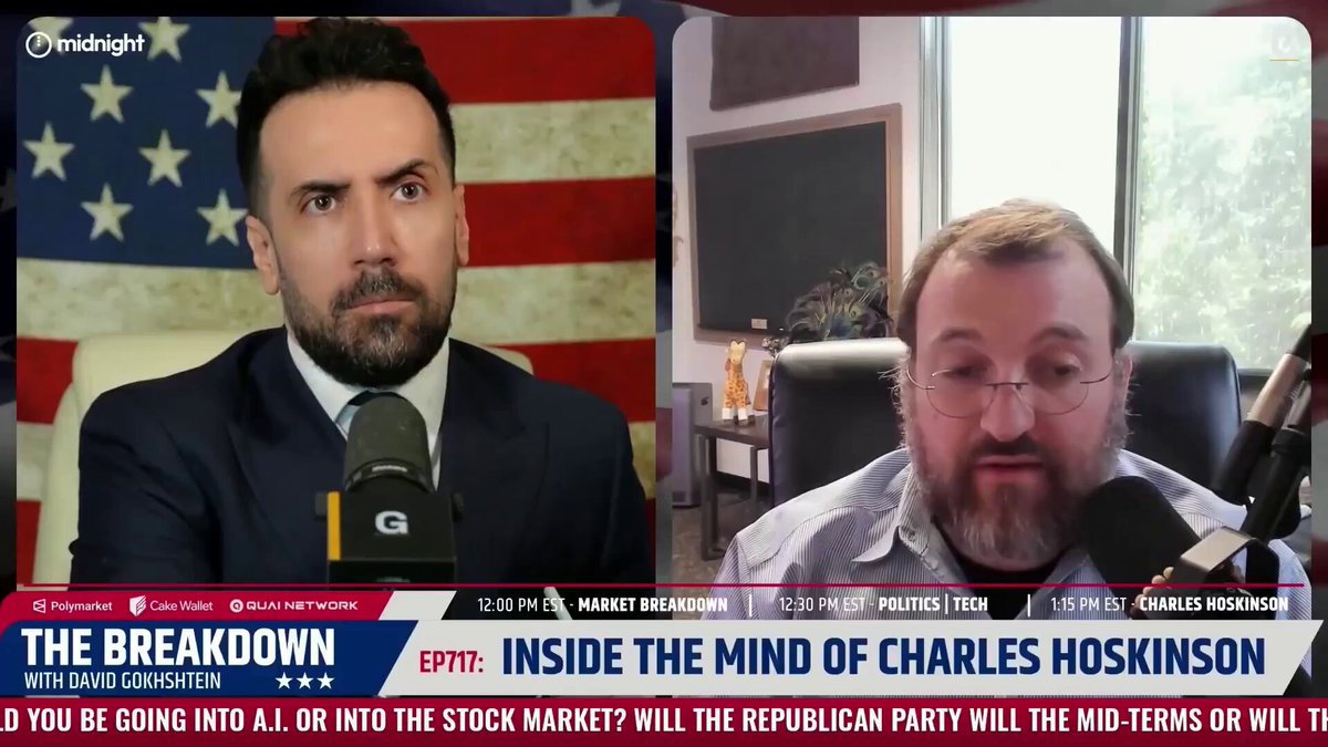 The image shows a news segment featuring two men, one wearing a suit and tie and the other wearing glasses. They are sitting at a table with microphones, suggesting that they are discussing or reporting on an important topic. The background features an American flag, which is often associated with news media organizations like CNN. The caption of the image reads "The Breakdown" in white text against a black background, indicating it's part of a news segment.