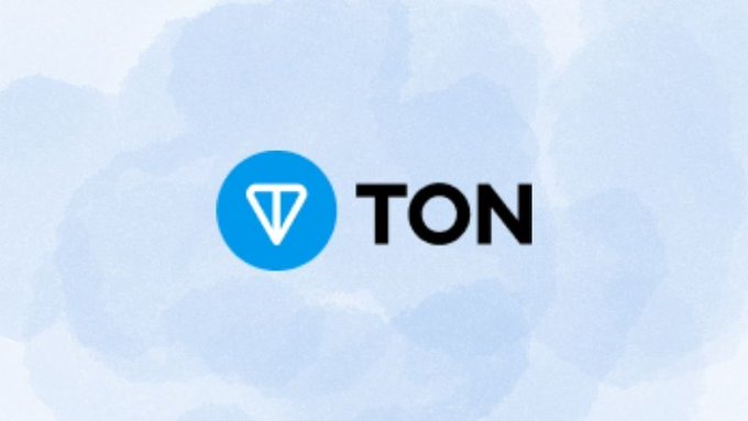 The image features a logo for a cryptocurrency called Toncoin, which was named after its founder, Pavel Durov. The logo consists of a blue circle with a white "V" inside, representing the coin's symbol. Below the logo is the name "TON", and the word "Coin" is written in black text below it. The image also includes some text that reads: "BREAKING: Pavel Durov Just Renamed Toncoin →  GRAM" which indicates a change in the coin's name, and "The Open Network" referring to the network where the coin operates.