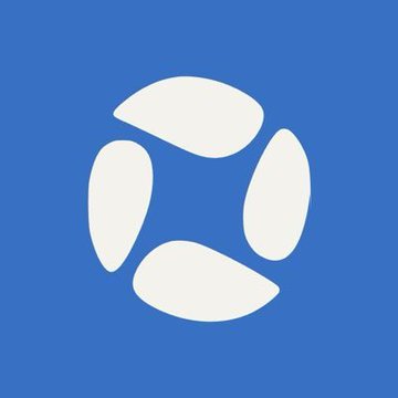 A blue square icon featuring a white stylized logo composed of four rounded, petal-like shapes arranged in a circular pattern, resembling a flower or pinwheel. The minimalist design visually represents the early-stage, building momentum of the $SESTRI project mentioned in the post, symbolizing growth and emerging attention before a major price move.