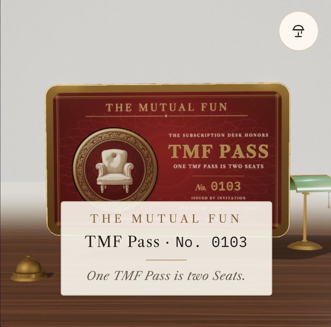 An illustration of "THE MUTUAL FUN TMF PASS" ticket No. 0103 in gold and red, with text noting "ONE TMF PASS IS TWO SEATS," displayed on a wooden desk with a bell.