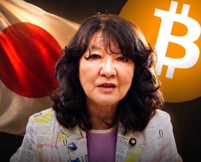 A woman with shoulder-length dark hair, identified as Japanese Finance Minister Satsuki Katayama, is shown in front of the Japanese flag and a Bitcoin (₿) logo, visually reinforcing the post's claim that Japan has officially legalized crypto ETFs by integrating digital assets into its stock and commodity exchanges.
