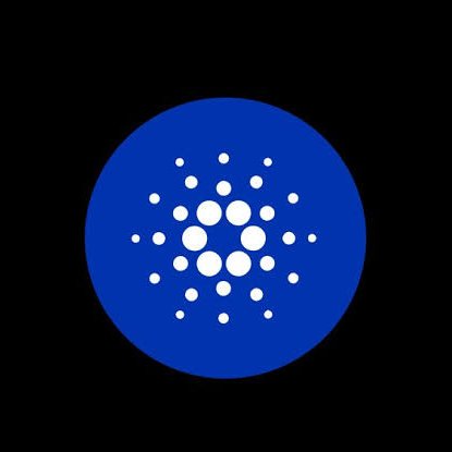 The image displays the blue Cardano ($ADA) logo, featuring a white circular cluster of dots on a blue background, representing the cryptocurrency mentioned in the post about Veridian tokenizing its shares on the Cardano blockchain.