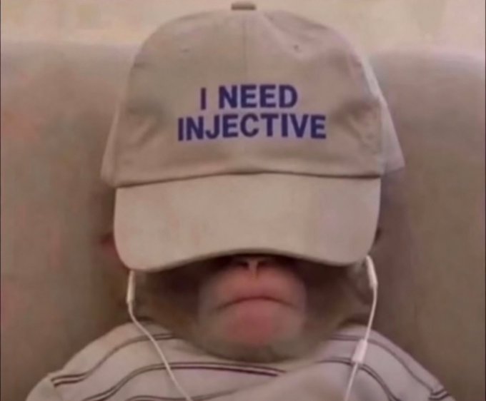 A dog wearing a beige baseball cap that reads 'I NEED INJECTIVE' with its tongue sticking out, sitting on a couch with earphones.