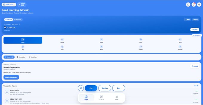 The image shows the redesigned OpenPay Home Dashboard featuring a greeting "Good morning, Mrwain" alongside wallet management options, a virtual card display, and transaction history—visually demonstrating the cleaner, more intuitive interface described in the post.