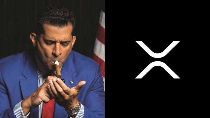 The image features a man dressed in a suit and tie holding a pipe with his mouth open while smoking. The background of the image is black, which contrasts with the white "X" logo that represents Ripple cryptocurrency. The text in the image reads "CRAZY: Business legend Patrick Bet-David $450,000,000 net worth bought $XRP and says it will hit $1,000 per token." This suggests that the man might be a successful businessman or an expert in the crypto world who has invested in Ripple cryptocurrency.