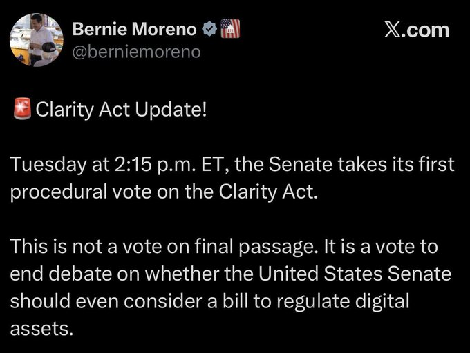 A tweet from Senator Bernie Moreno (@berniemoreno) announces a "Clarity Act Update," confirming that the Senate will hold its first procedural vote on the Clarity Act on Tuesday at 2:15 p.m. ET—a vote on whether to end debate on considering digital asset regulation, not on final passage.