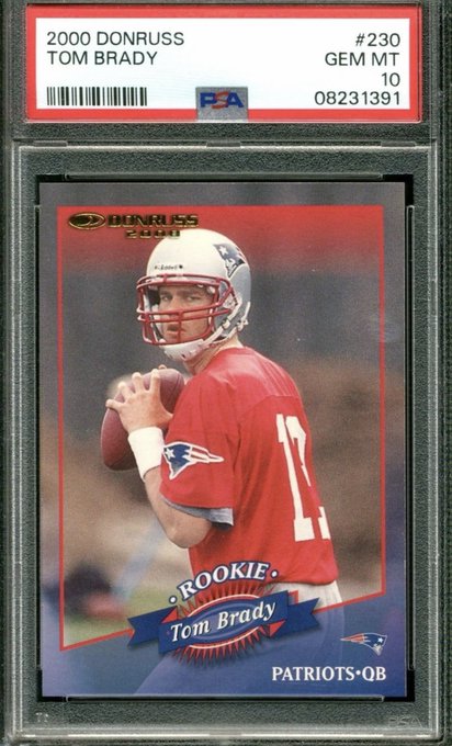 A PSA-graded 2000 Donruss Tom Brady rookie card (#230, GEM MT 10) is displayed in its protective slab, showing Brady in his New England Patriots uniform preparing to throw.