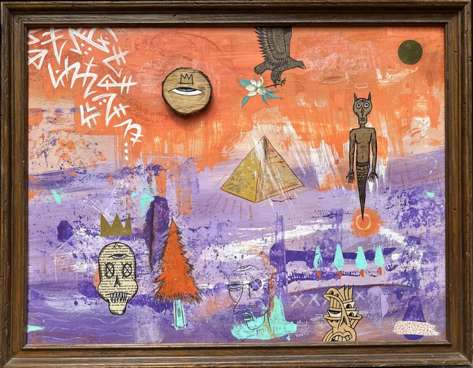 A framed mixed-media artwork featuring a vibrant orange and purple background with various iconic symbols including a smiley face, pyramid, eagle, angel, crown, skull, and a small figure with a halo, all combined with graffiti-style text and abstract elements.