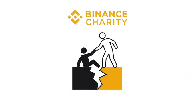 The image shows the Binance Charity logo above a simple black-and-white graphic of two figures helping each other across a cracked chasm, symbolizing support during disaster. This imagery aligns with Binance Charity's $650,000 donation to users affected by the recent earthquake in Colombia, accompanied by the message "We stand with Colombia" and waived P2P transaction fees until August 18.