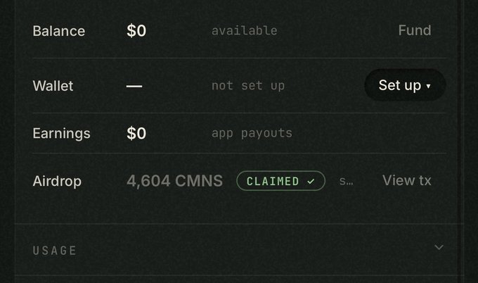 A dark-themed wallet interface showing a $0 balance, an unconfigured wallet, $0 in app payouts, and a claimed airdrop of 4,604 CMNS tokens.
