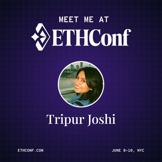 The image features a woman with dark hair, wearing a blue jacket, smiling at the camera. She is sitting next to a city skyline backdrop that reads "ETHCONF" in white letters. The text "meet me at ethconf" is also present on the image.