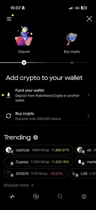 A Robinhood Crypto app screenshot showing 'Add crypto to your wallet' options for Deposit and Buy crypto, with trending tokens listed including cashcat (+1,880.67%), Cupsey (+1,202.18%), and ANSEM (-29.92%).