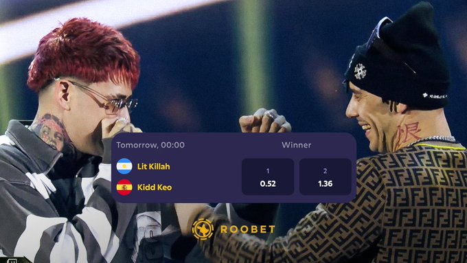 Two men with face tattoos face off in what appears to be a rap battle; an on-screen graphic reads 'Tomorrow, 00:00 Winner' showing 'Lit Killah' vs 'Kidd Keo' with scores 0.52 and 1.36, branded 'ROOBET'.