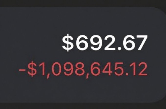 A dark screen displays a balance of '$692.67' in white text above a red negative value of '-$1,098,645.12'.