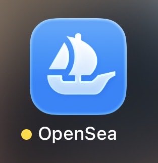 The OpenSea app icon, depicting a white sailboat on a blue background.