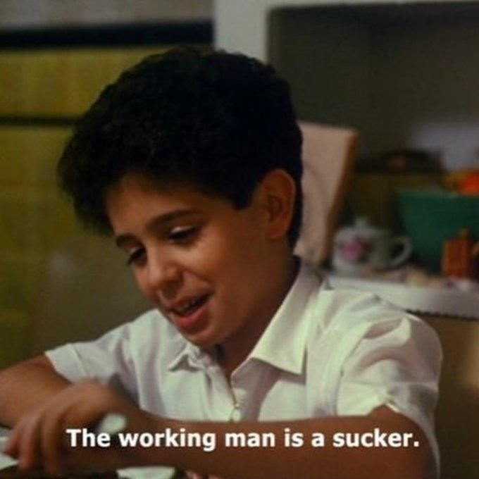A meme screenshot of a young boy from a sitcom with the caption 'The working man is a sucker.'